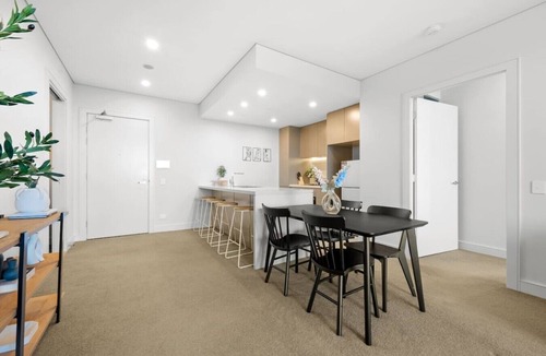 Sydney Olympic Park Apartment | Luxury 2BR Oasis – Panoramic CBD & Park Views