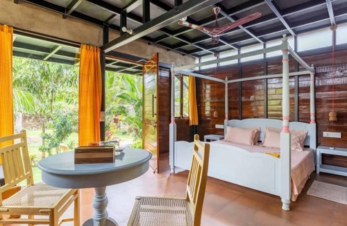 Morjim House | Luxury cottages in lush green panoramic windows