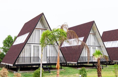 Faridabad Villa | Malik Farms Countryside Wooden Cottage on 2 Acre Estate with Shared Pool, Garden & Restaurant