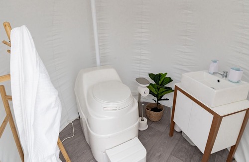 Tenterfield RV Rental | Mirumiru Bubbletent: Romantic Glamping under the Stars! Vintage Outdoor Bath.