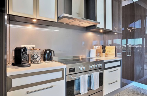 Nangkita House | Modern waterfront retreat, with indoor heated pool and games room.