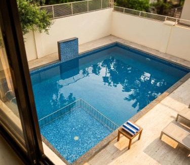 Morjim Hotel | Morjim Pride Hotel with Swimming Pool near Morjim Beach
