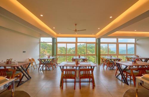 Devikolam Resort | Nature Green Pool Resort Munnar by VOYE HOMES