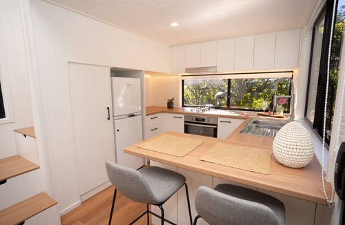 Nunderi Cabin | Nestled in Nunderi, this loft style tiny home offers a special retreat for two!