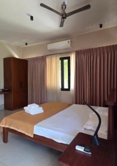 Tenkasi House | Nirmala's farmhouse - The Red room