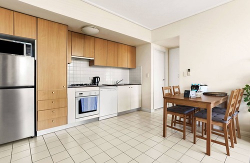 Sydney Olympic Park Apartment | Ocean Oasis: Pool, Man-Made Beach, Ultimate Escape