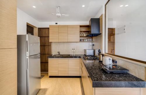 Kurla Apartment | OV Premium Apartments near BKC by SquareOne Stays