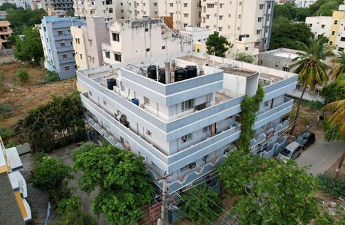 Tirupati Apartment | Pent house room with king-size bed