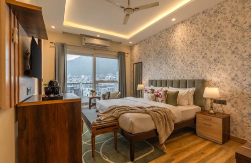 Tapovan Hotel | Perfectstayz Premium Pinaaki Rooftop cafe with Ganges view