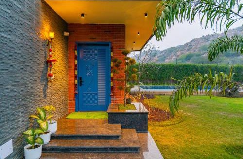 Gurugram Villa | Prassanam Vatika 2-BHK Hillside Villa with Private Pool & Expansive 1-Acre Garden
