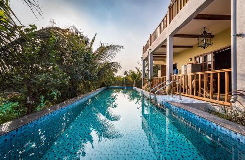 Wadgaon Villa | SaffronStays Happy Fields - Swimming pool farmhouse with farm views, hammocks & farm-to-table dining near Pune