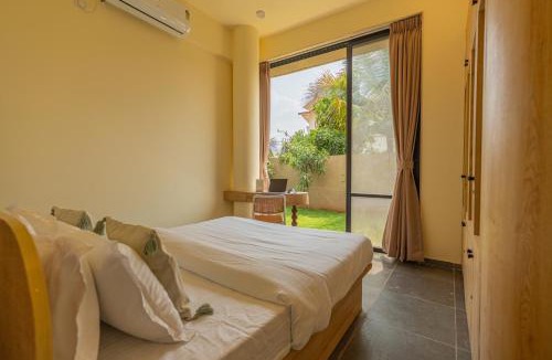 Malavli Villa | SaffronStays Ivory and Orange