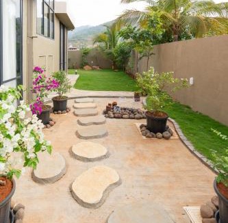 Malavli Villa | SaffronStays Ivory and Orange