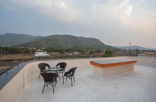Malavli Villa | SaffronStays Ivory and Orange