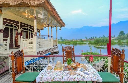 Dal Lake Boat Rental | SaffronStays Kingori Houseboat - luxury houseboat with private deck, shikara high tea & lake views
