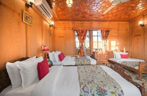 Dal Lake Boat Rental | SaffronStays Kingori Houseboat - luxury houseboat with private deck, shikara high tea & lake views