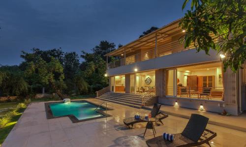 Gaulwadi Villa | SaffronStays Nilaya by the River - 3BR riverside villa with private pool, bonfire, BBQ & river views