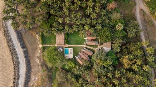 Murud House | SaffronStays Ovates By The Sea