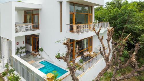 Bedla Villa | SaffronStays Villa Bougain - 2BR hill-view villa with plunge pool, Veg BBQ, birdwatching & serene garden sit-outs