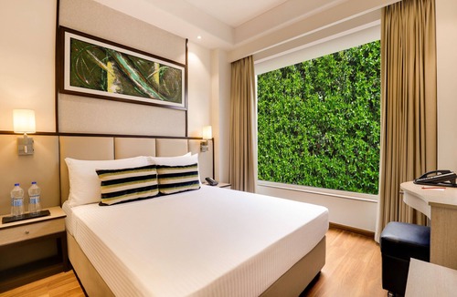 Noida Hotel | Sandal Suites Op. by Lemon Tree Hotels