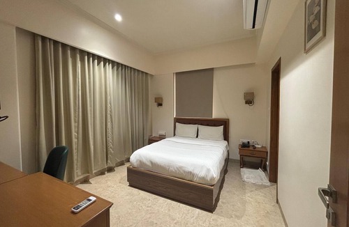 Eksar Hotel | Shelter Suites (Formerly known as Fisco The Hub Link)