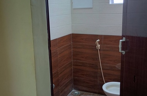 Theni Hotel | Sri Vasishta Homestays