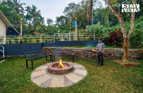 Vellamunda Villa | StayVista at Aradhya Villa with Infinity Pool, Lawn