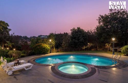 Nashik Villa | StayVista at Brickhouse Aranya with Pool and Farm View