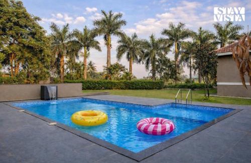 Nashik Villa | StayVista at Canton Villa with Outdoor Pool, AC, WiFi
