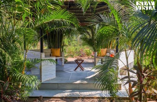 Vasai Villa | StayVista at Maison Vera with Pool, River front view