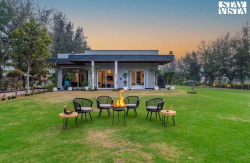 Pataudi Villa | StayVista at Meadow Muse with Outdoor Pool - Manesar