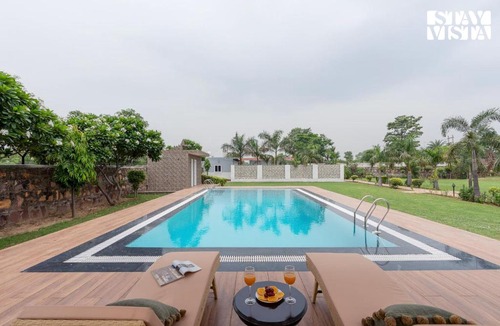 Gurugram Villa | StayVista at Sunrise Manor with Pool and Lawn