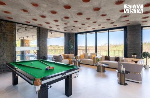 Nashik Villa | StayVista at The Earth Stone with Infinity Pool, Lawn
