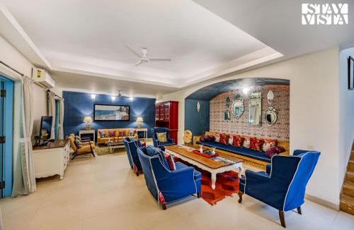 Grand Morrod Villa | StayVista at Villa Nimaya with Lawn & Pool