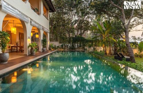 Aradi Socorro Villa | StayVista at Villa Rumjhum - Pool, BBQ & Bonfire