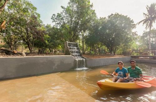 Vaijanath Villa | StayVista's Santoni Farms - Riverside Bliss with Pool, Orchard & Activities