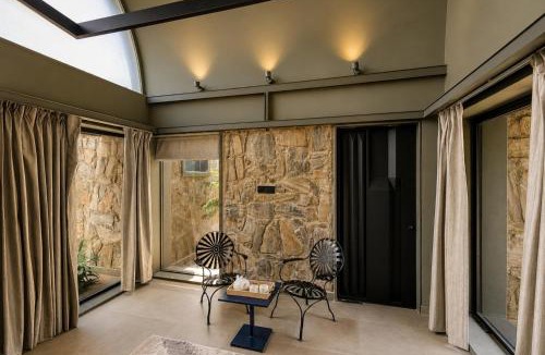 Jalor Villa | Stone Age Home Fernwood 6-BHK Stone-Clad Estate with Bamboo Cottages, Private Pool, Gazebo & Terrace Garden