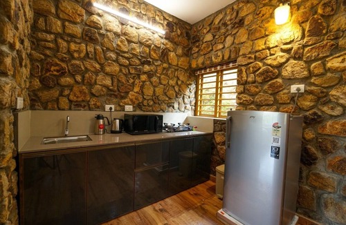 Elappara Villa | Stone castle by voye homes