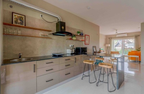Nerul Apartment | Stylish 2BHK Condo with Pool Access & Gym Near Candolim Beach