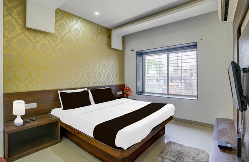 Panchavati Hotel | Super Townhouse Godavari Riverbank Formerly Shanti Datta Inn