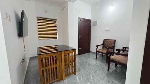 Alwaye Hotel | The Home Apartment