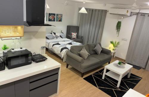Viman Nagar Apartment | The white Port Luxe Studio Near Airport Symbiosis college Viman Nagar close to kalyani nagar & Koregaon Park