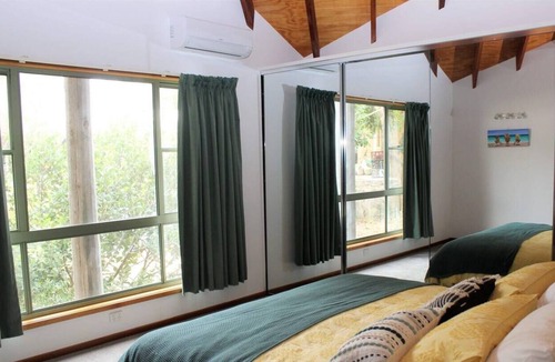 Boomerang Beach House | Timeless house with heated spa pool, walk to beaches.