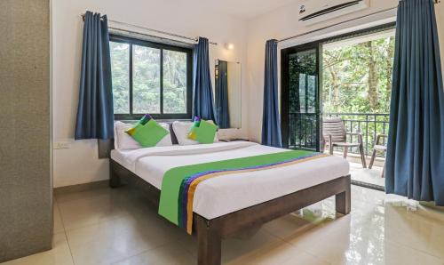 Arpora Hotel | Treebo Aquamarine Arpora With Pool