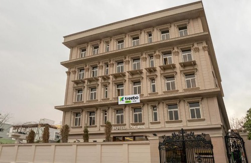 Gachibowli Hotel | Treebo Purva Crest, Gachibowli DLF