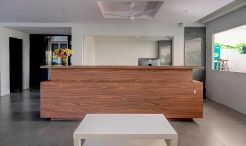 Rushikonda Hotel | Treebo Rushi Grand, 1 km to Rushikonda Beach