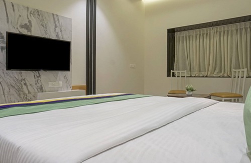 Nashik Hotel | Treebo The Utsav, Nashik