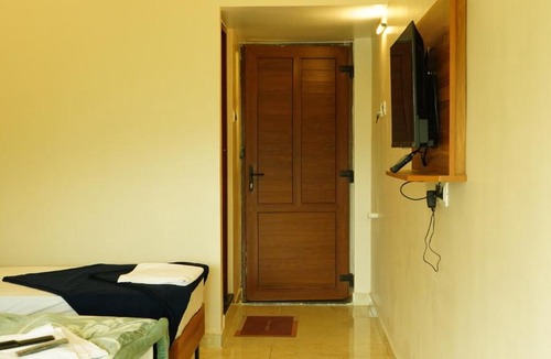 Valparai Hotel | Vasu Inn - Rooms in Valparai