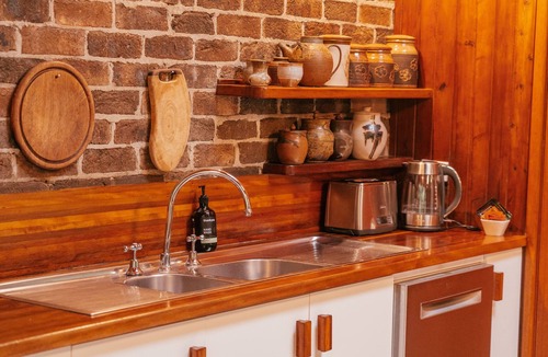 Hallidays Point House | Woodbine Homestead a Bush and Beach Retreat with a comfortable cosy feel