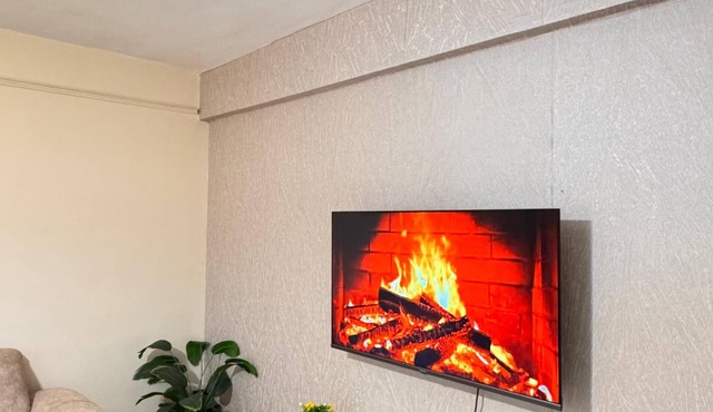 Cosy Homes Eldoret. Queen bed overlooking downtown. in Eldoret